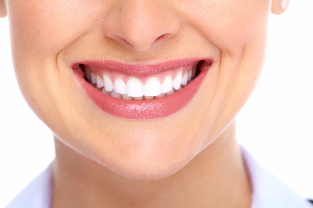 A closeup view of a beautifully white smile.